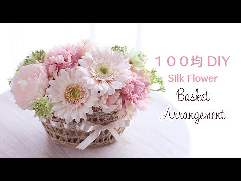 DIY Flower arrangement made from artificial flowers.Gerbera and ranunculus flower arrangement.