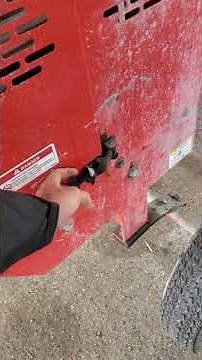 Overview of a "Multiquip" tow behind concrete mixer