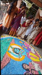 #Onam day 9 - With just His little finger, Lord Krishna lifts the entire Govardhana Mountain to protect the people of Gokul from a devastating storm. With His other hand, calming melodies flow from His divine flute. | Amma