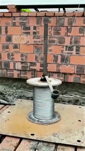 How to manually release wire from this big spool?