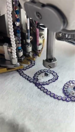 Beads & sequin sewing machine can use in industry as clothing fabrics,home textile,wedding dress etc