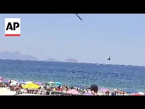 Video shows ultralight plane crash off Copacabana Beach in Brazil, killing pilot
