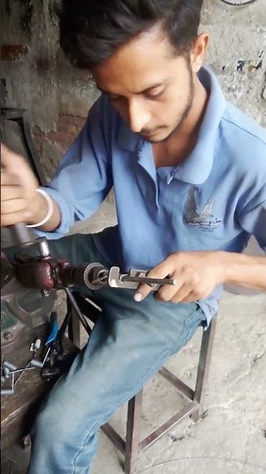 Making a small tension spring by hand drill#short