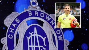 Former AFL umpire charged in Brownlow betting scandal