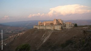 Wide angle view of Krak des Chevaliers castle showing its vast size and surrounding Syria landscape