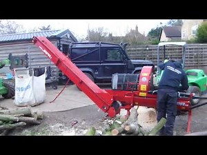 RMCAvant ~ Avant Loader and a Japa 300 Log cutter & Splitter with conveyor processing caldwood.