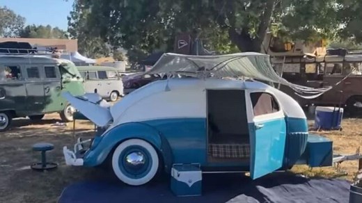 This classic Volkswagen Beetle transformed into teardrop camper is a head-turner
