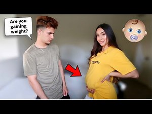 SEEING IF HE NOTICES MY BABY BUMP...