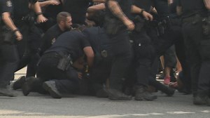 Chaos as City of Vancouver staff move in on East Hastings tent and structures