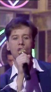 Simple Minds sing their exciting song Waterfront in 1983