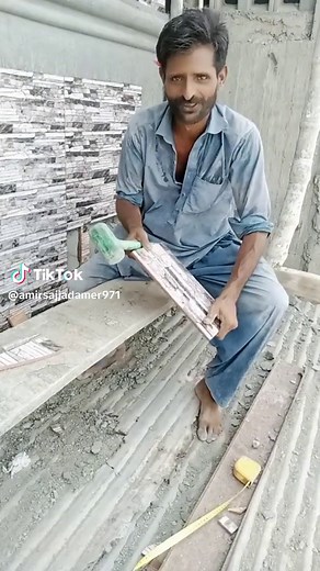 Applying Adhesive to Tiled Surfaces Outdoors