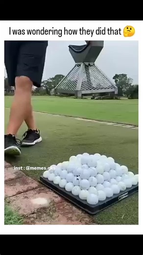 Memes Gks™ on Instagram: "This instagram reel shares a short video revealing a pyramid-shaped golf ball dispenser that efficiently stacks balls into neat pyramids at driving ranges, satisfying the author's curiosity about the seemingly magical process. Posted on December 31, 2025, it quickly amassed 408,730 views and 1,421 likes, with replies humorously admitting misconceptions like manual stacking or alien involvement. Devices like the Stacker Inc. pyramid builder reduce setup time by allowing 