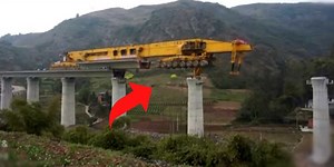 Segmental bridge launching machine