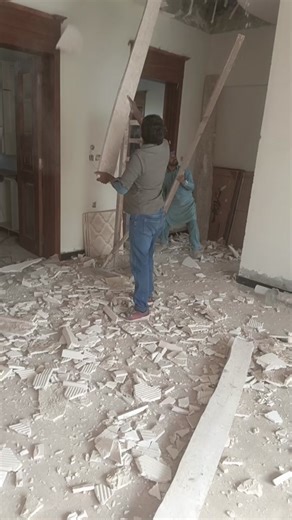 Demolition Process Inside a Building Room