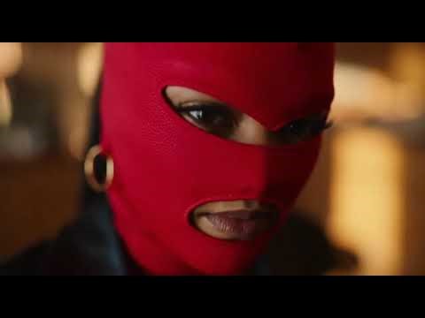 Brazen Bank Robbery: Female Robber wearing red leather mask ties up victims with Duct Tape!