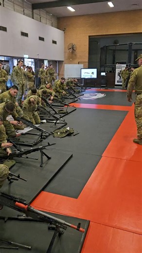 "Re-assemble the weapon!" Soldiers learning how the MAG-58 machine gun's parts work together so they'll be ready to understand then fix any problem if the gun stops firing. | 7th Brigade - Australian Army