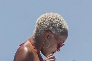 Doja Cat Shows Off Massive Booty in Orange Bikini on Yacht - BlackSportsOnline
