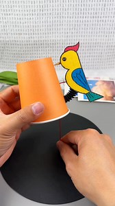 7.7K views · 45 reactions | Title: Flapping Bird Cup Puppet Craft Hashtags: #FlappingBirdCraft #BirdCupPuppet #DIYPuppetBird #CupPuppetDIY #KidsBirdCraft #FlyingBirdPuppet #CreativeCupCraft #EasyBirdPuppet #HandmadeBirdToy #FunWithPuppets | paper craft ideas | Facebook