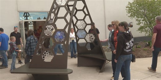 Welded art pieces created by students decorate downtown Wausau