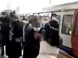 Footage shows woman in wedding dress fighting on tube platform