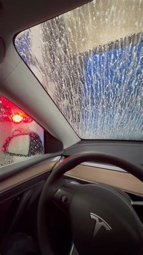 Car washing front and side windows Tesla