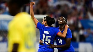 France wins 3-2 in opener despite late surge from Colombia