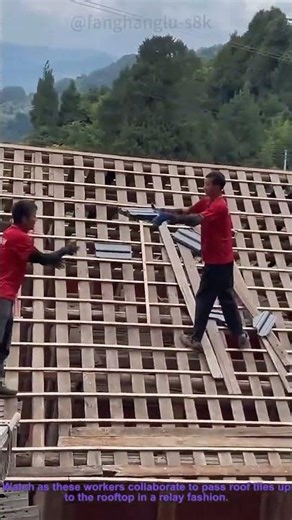 Traditional Roofing: Workers Relay Tiles to the Rooftop