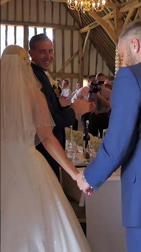 wedding couple enter the reception