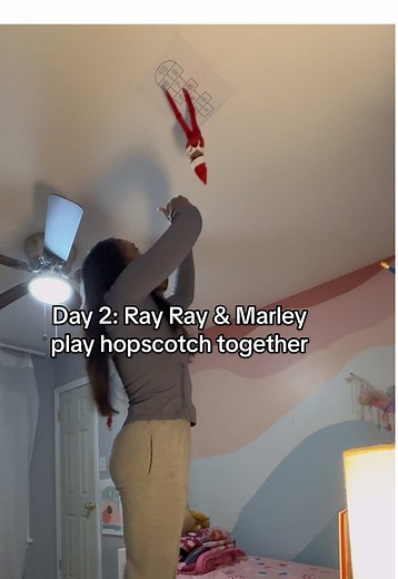 Day 2: Ray Ray and Marley play hopscotch together. #momsoftiktok #elfontheshelf #elf #familyfun #fyp