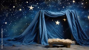 Closeup of a beautiful handmade nativity backdrop, depicting a starry night sky and a shining star above the manger, created by the children and their parents.
