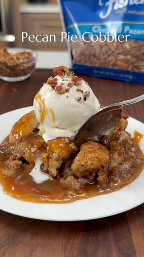 Pecan Ple Cobbler #AD I've got the ultimate Thanksgiving dessert to share with you, Pecan Pie Cobbler! This is a twist on two classic recipes: pecan pie and cobbler. It's crazy delicious, everyone will be going for seconds! The star ingredient is Fisher Nuts Pecans. Fisher nuts has a great assortment of nuts that is a pantry staple especially during the holidays. Head to your local grocery store today to pickup Fisher Nuts. Cobbler: 1 ½ cups, 1.1 GF flour or all purpose flour, 1 tbsp baking powd