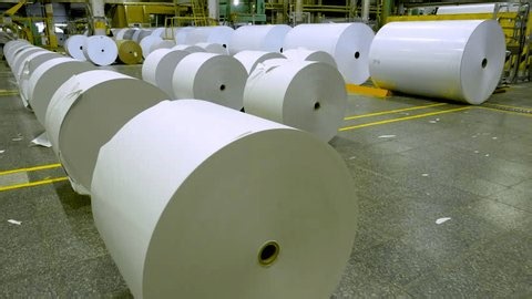 clip-3973807627--the-worker-operator-opens-flaps-paper-machine