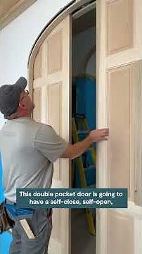 Seven Stones: Arched Sliding Doors into Dining Room