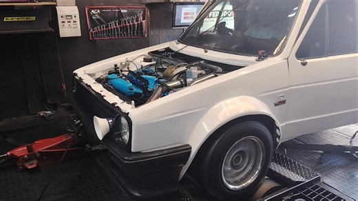 Very very neat setup making some insane power for just rods and a turbo upgrade | Hoc Tuning