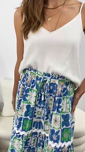 The Hallie Skirt is just a good, easy maxi skirt skirt. A lovely shape, we love the ric rac detail in between the tiers, and the elastic waist. The print is epic, AND it's super versatile - pull it up over your boobs and wear as a dress x x Shop HERE: vineapparel.com/products/hallie-skirt Kym's wearing an 8 and is 175cm tall x | Vine Apparel