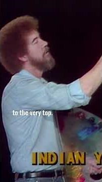 Bob Ross sets the base of his painting with background colors