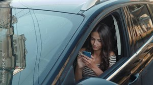 girl using smart phone voice recognition, dictates thoughts, voice dialing message speech ai helper at car driver inside student model young