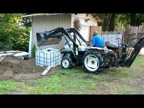 Kelley Backhoe Digging Water Cistern