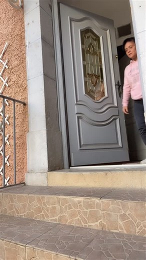 Relaxing Moments on Front Steps in a Residential Area
