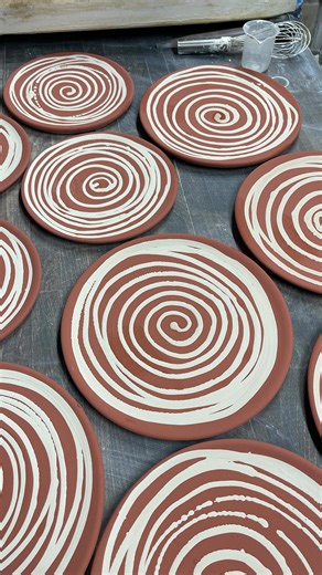 Just finished this batch of plates for a dinnerware commission. I wasn’t sure how the top color would look with the amber background glaze, but I love how they turned out! We’ll be delivering this set to its new home this weekend | RD Ceramics