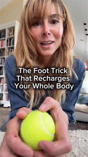 I used to think rolling a tennis ball under my feet was just about loosening tight muscles… Until I learned what it actually does to your bioelectric system. Your fascia isn’t just tissue -it’s a liquid crystal matrix that carries light, sound, and charge through your whole body. When it stiffens, your cells lose communication and you lose energy. Rolling your feet re-hydrates and re-charges the fascia line that connects your feet to your vagus nerve and your brain. It’s one of the fastest ways 