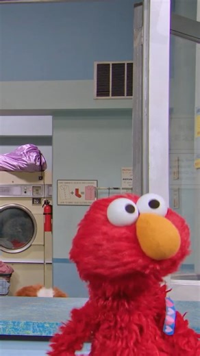 Elmo on Instagram: "Laundry Day: brought to you by the smell of Elmo's socks! 😂🧦"