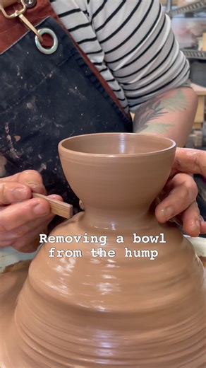 Throwing off a hump of clay takes a bit of practice. The most common problem is cutting through the base of your pot when wiring off. The way I prevent this is by creating a thick foot with a wood knife. This defines the base and ensures there is a 1/2 inch of clay at the base of the piece. I then cut a guide line which makes it easier to wire through and stay level. #potterystudio #studioceramics #wheelthrown #pottery #potteryartist