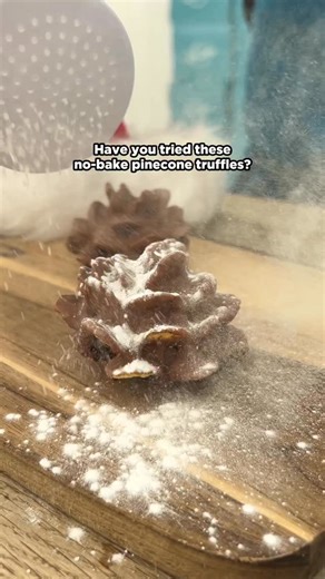 The Big Bakes on Instagram: "Meet Pinecone Truffles! 🌲🤩 A stunning, crunchy dessert that looks like a masterpiece but is secretly so simple. Save this for your festive spread! INGREDIENTS 🛒 Ganache: 115g dark chocolate + 60ml heavy cream. (Optional: 2 tsp vanilla) Texture: 3 cups cornflakes + 225g melted chocolate (for dipping). THE METHOD 🥣 1. The Core: Melt cream & chocolate together. Chill for 2 hours, then roll into small egg shapes. 2.The Scales: Press cornflakes firmly all over the gan