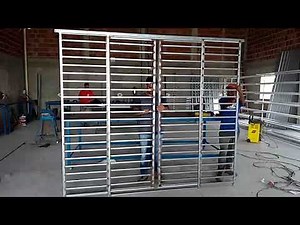 Grade de proteção de porta de vidro em metalon galvanizado ficou muito legal