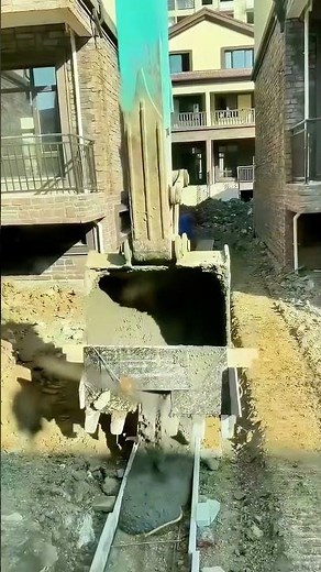 Excavator pours concrete precisely