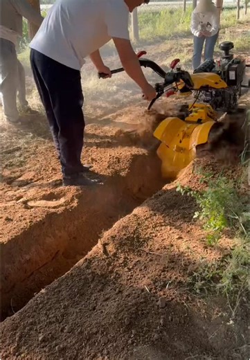 Efficient trenching,your go-to machine for seamless digging #agro #dig #tractor