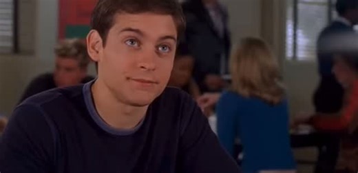Born Influenced on Instagram: "In the iconic cafeteria “tray catch” scene from Spider-Man (2002), where Peter Parker (Tobey Maguire) snags Mary Jane’s lunch and somehow keeps every item from falling, it’s long been said the shot took 156 takes to get right. Instead of relying on CGI, the production team went practical, using a sticky substance on the tray to help everything stay in place, making the moment even more impressive knowing it was actually done on set."