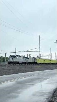 Amtrak KN 720 with loaded ballast cars leaving Conrail’s Morrisville Yard