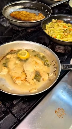 Savor our classic Chicken Picatta at Naples Italian ✨ Tender pan-seared chicken, a vibrant lemon caper sauce, and angel hair pasta come together for a simple, elegant Italian classic. 🍝🇮🇹 | Naples Italian Ristorante